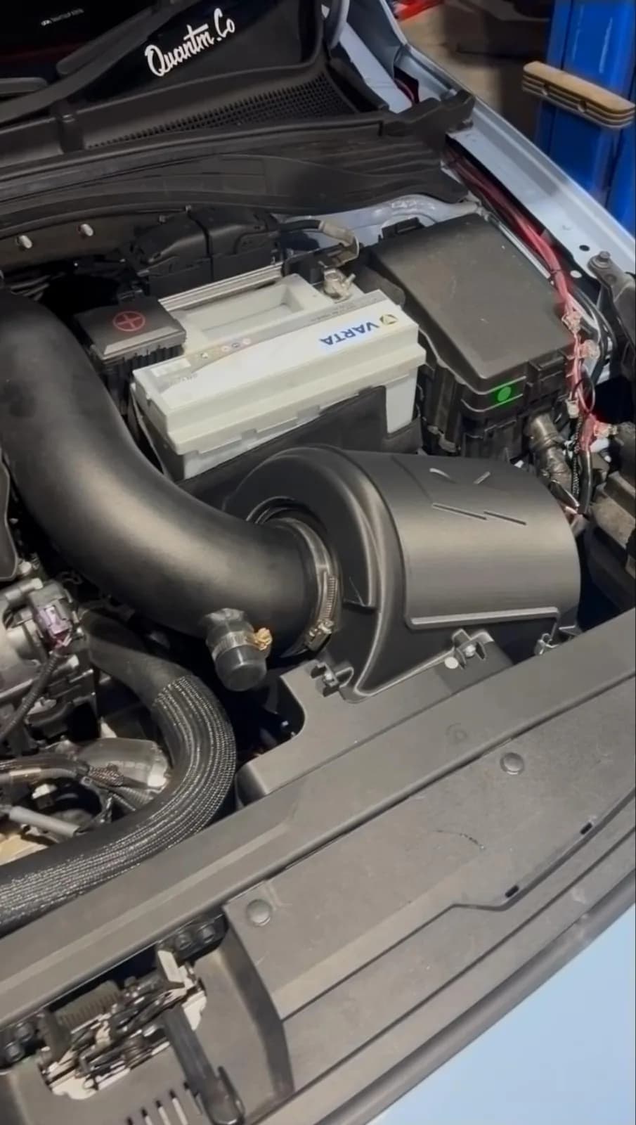 Roccomotive airbox enclosure with the R moulded into it, fitted around the Forge intake in a Hyundai i30 N Hatch