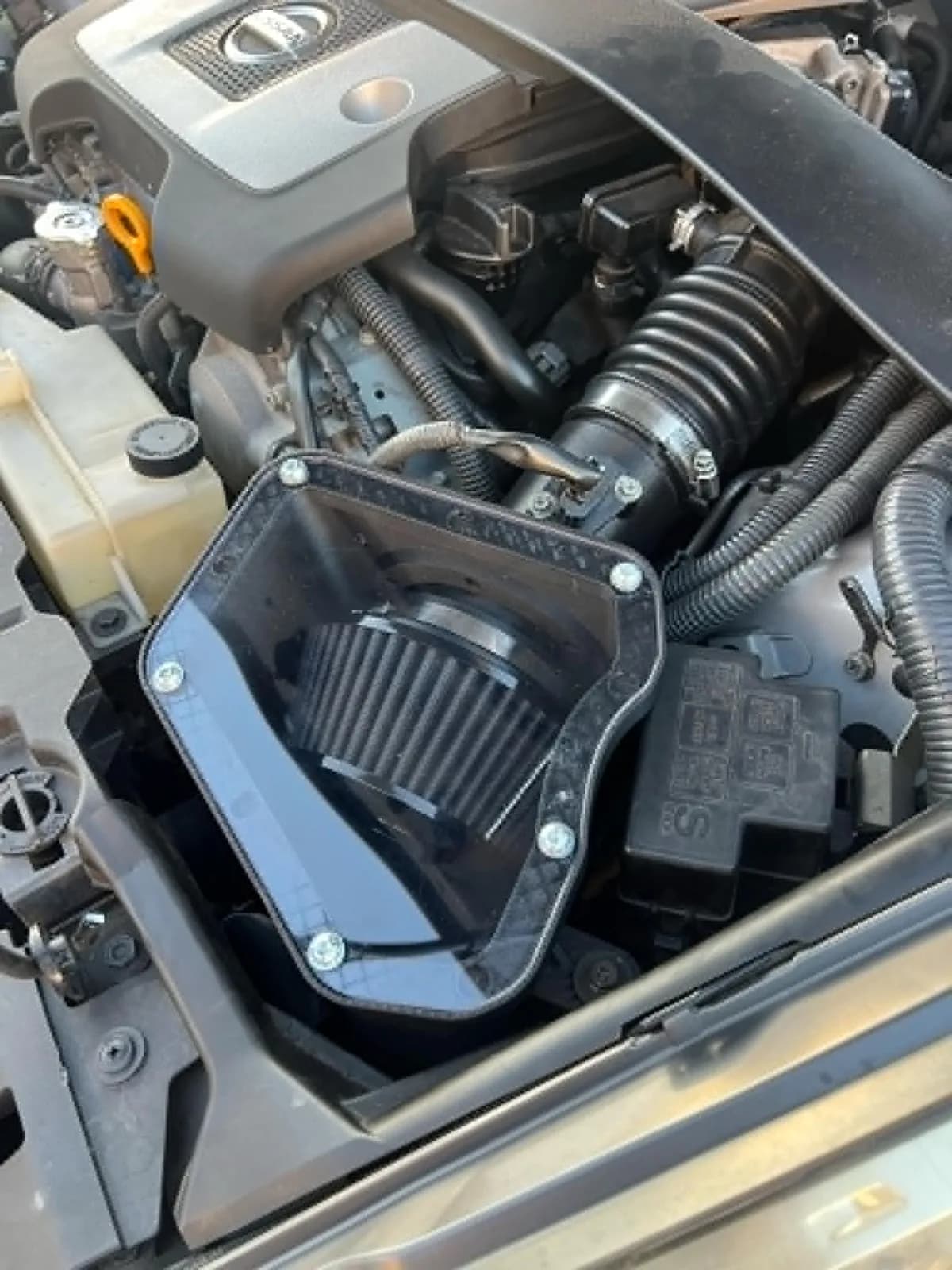 A second view of the 370Z airbox with its clear inspection cover