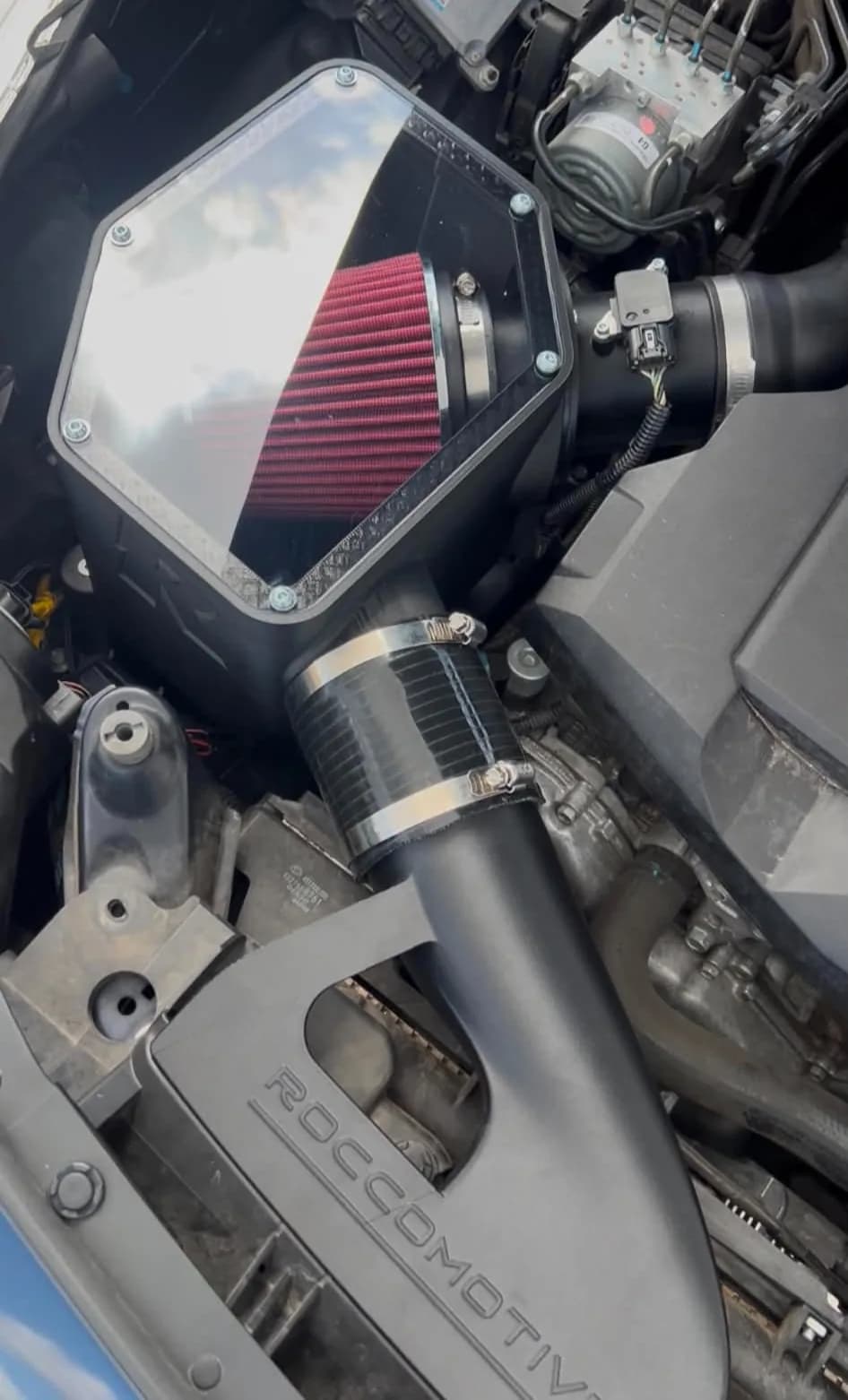 Roccomotive Liberty 3.6R airbox with clear cover and high-flow filter fitted in the engine bay