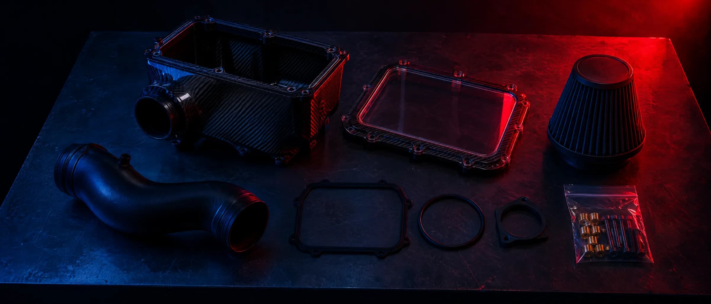 An airbox laid out as an exploded view — box, lid, pipe, gaskets, filter, hardware